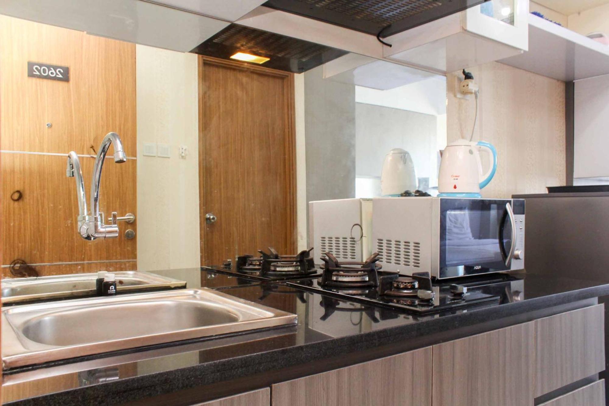 Homey And Tidy At The Oasis By Travelio Apartemen *