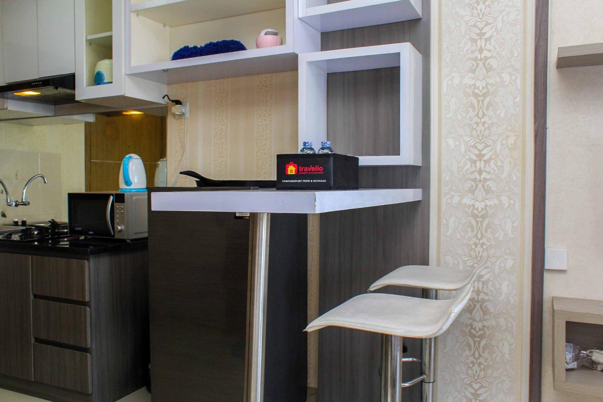 Homey And Tidy At The Oasis By Travelio Apartemen