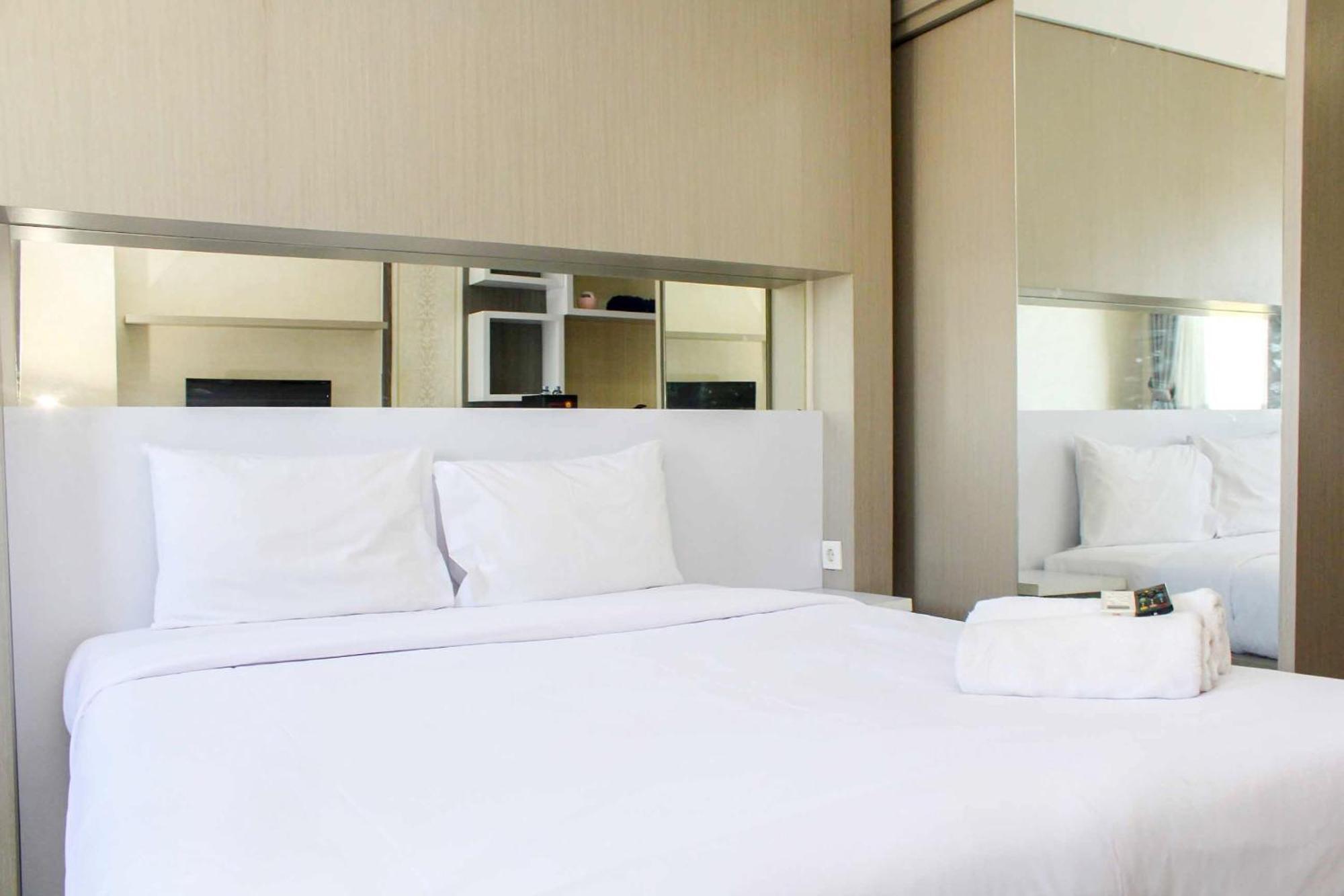 Homey And Tidy At The Oasis By Travelio Apartemen